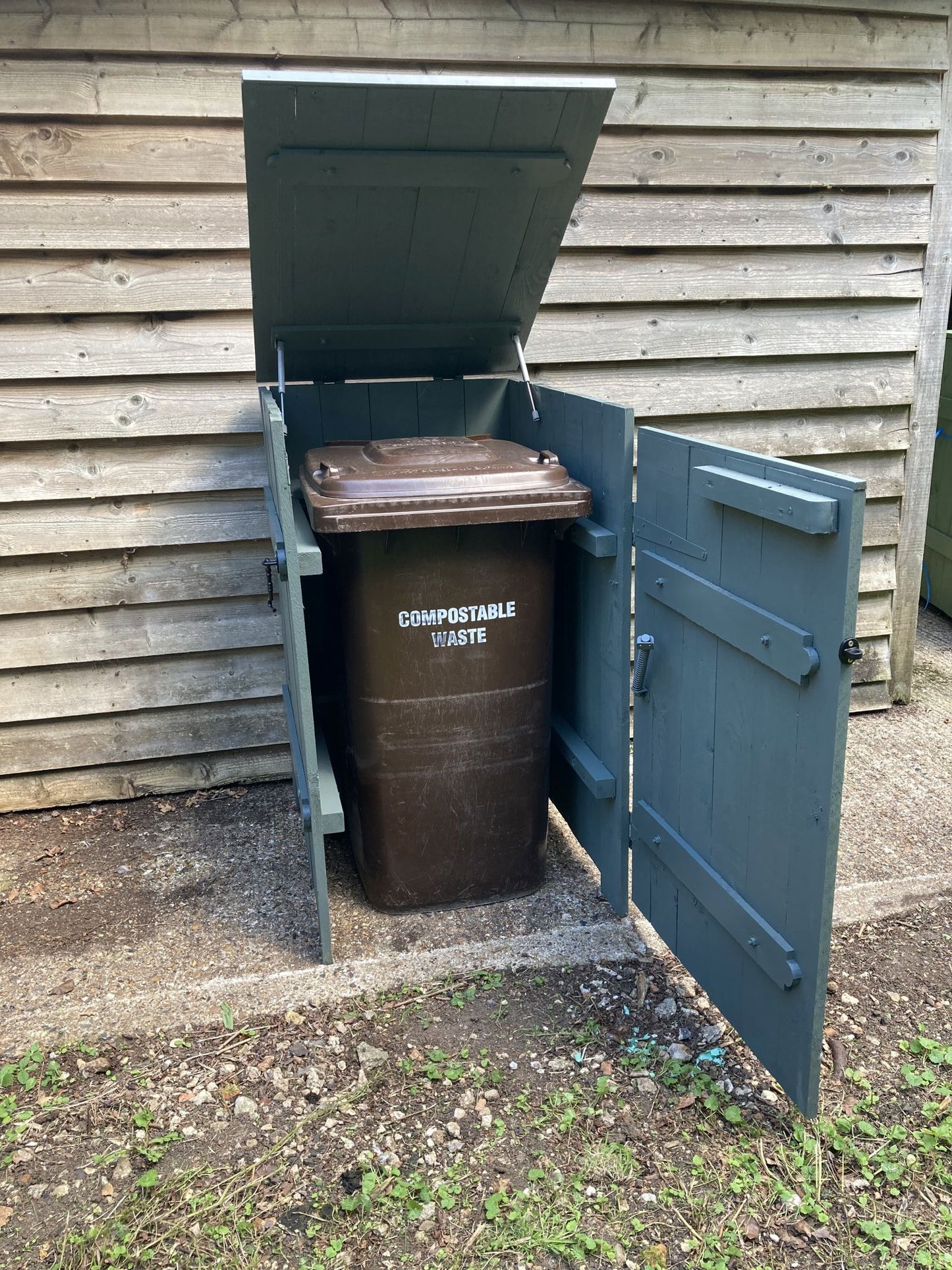 Wheelie Bin Store with open lid and open door